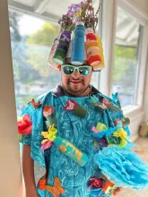 alex dressed for trashion show